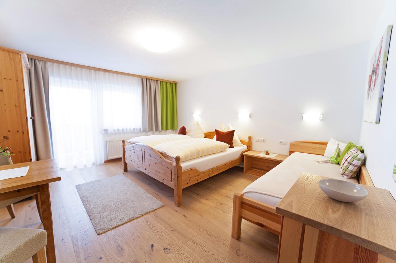 Dreibettzimmer mit Balkon